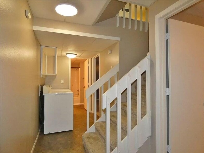 Hallway Downstairs with Washer and Dryer - 77 Brook Cir