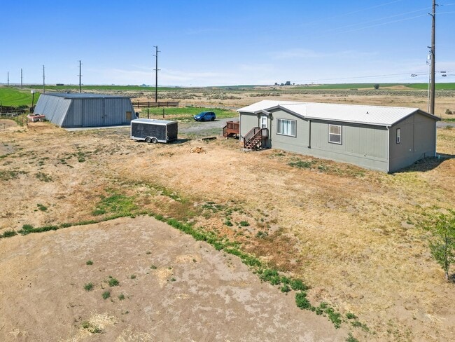 Building Photo - Country Living with a Huge Shop - 3BR on Acreage, Livestock Welcome!