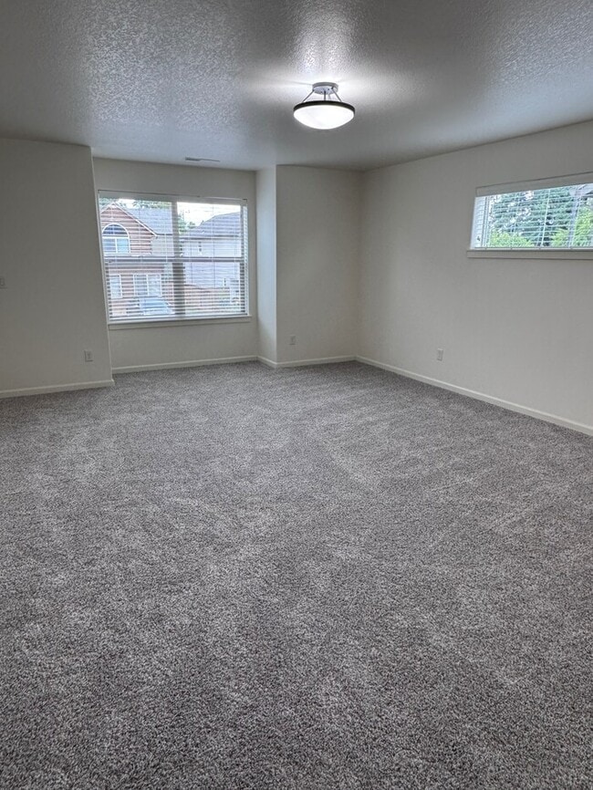 Building Photo - Beautiful Home with LVP Flooring, SS Appliances, Garage, W/D, Fenced Yard, LARGE Master & MORE!