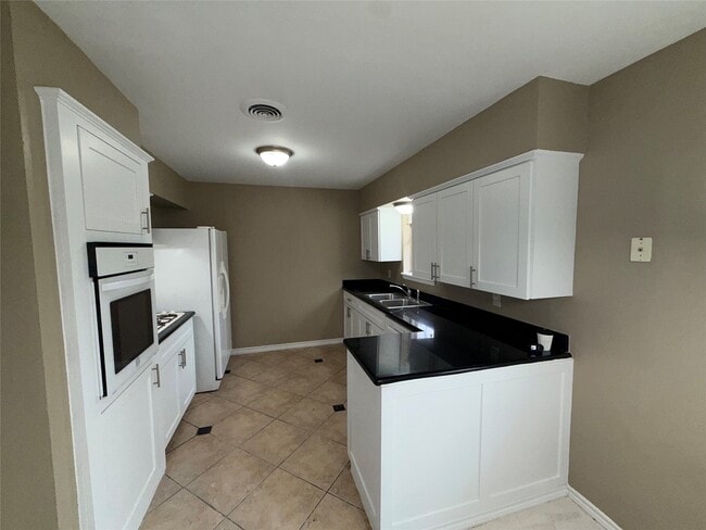 Building Photo - 7306 Troulon Dr