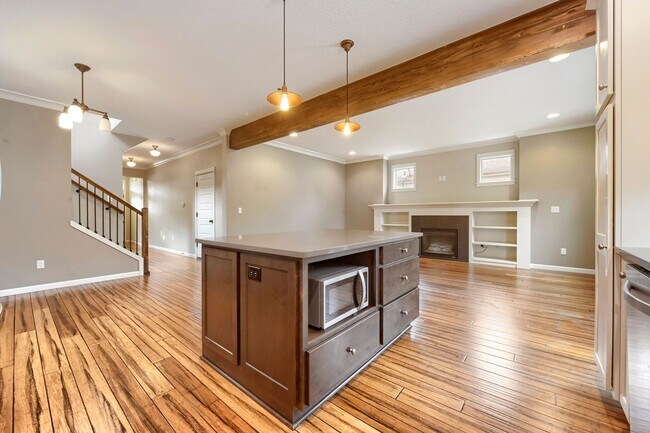Building Photo - Custom-Built 4BR/2.5BA Two-Story Near Woodstock — Quartz Island Kitchen, Gas Fireplace & Fenced Y...