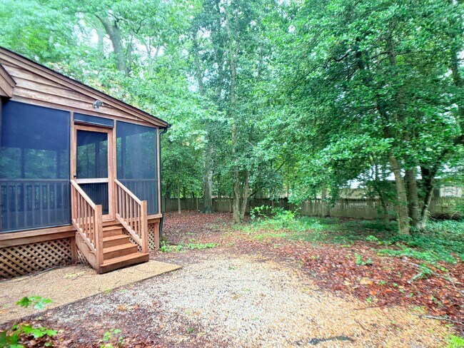 Building Photo - Charming, large wooded lot.