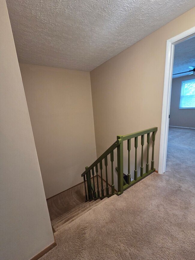 Building Photo - Serene Living in a Quiet Lakeside Community