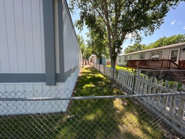 Building Photo - 3 Bed 2 Bath Mobile Home with Fenced Yard and Storage Shed