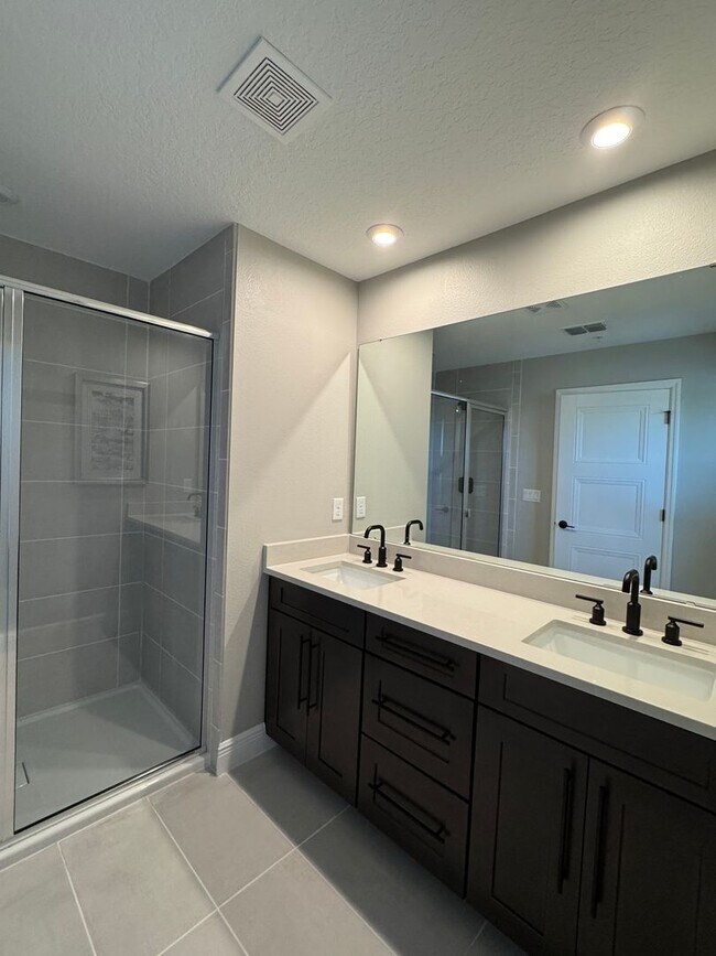 Building Photo - Elegant living in a vibrant, strategically located community—your perfect place to call home.