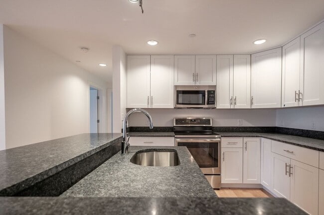 Building Photo - 2BR/2BA Old Port Condo Onsite Parking Available, Fitness Room and Elevator