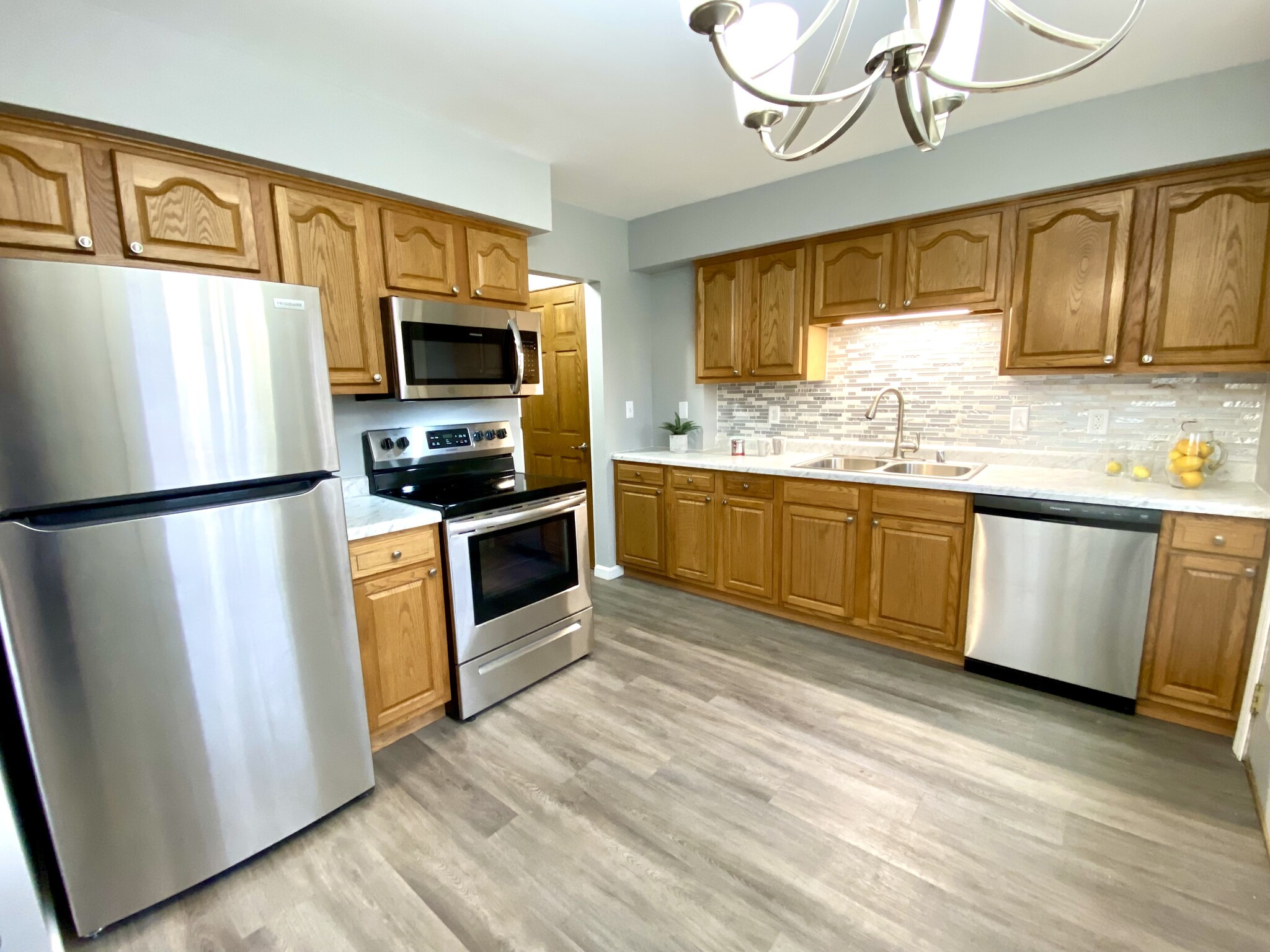 Updated Kitchen with New Counters, NEW Stainless Steel Appliances & Ceramic Tiled Backsplash! - N89W15976 Main St