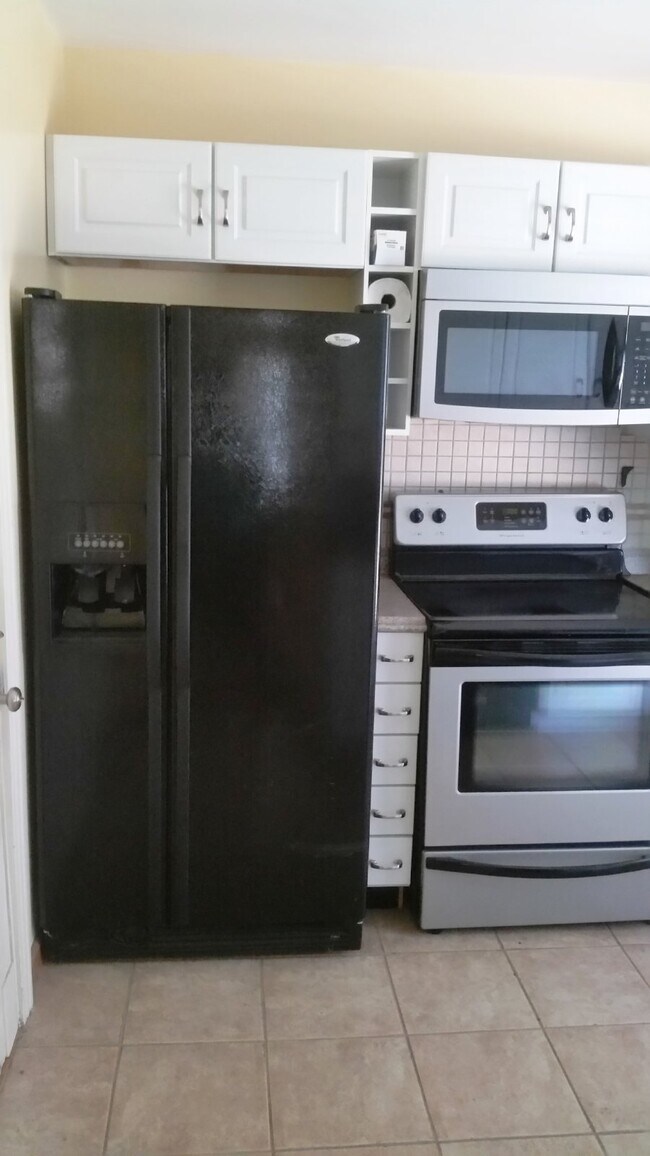 Building Photo - Extended Stay Studio apartment, 1 bed, 1 bath; fully furnished, all utilities and lawn care inclu...