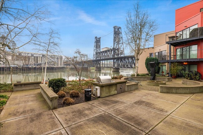 Building Photo - Newly Renovated condo with Stunning River ...