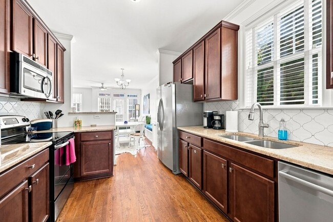 Building Photo - Fully Furnished Option Available | Modern End-Unit Townhome | Prime Raleigh Location