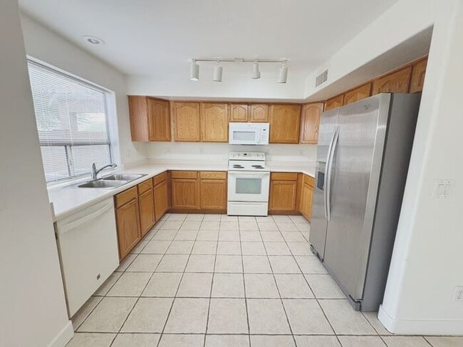 Building Photo - MOVE IN SPECIALS!! 15 DAYS RENT FREE!! Wonderful large, 4 br 2.5 ba family home in Johnson Ranch