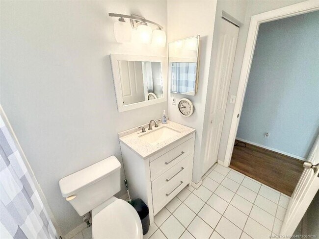 Building Photo - 3486 SW Pindo Palm Ln