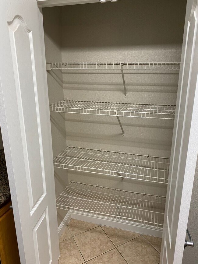 Building Photo - SW!! First floor unit with Balcony!! Gated!! Clubhouse!!  Community pool!! Spa!! Exercise Room!! ...