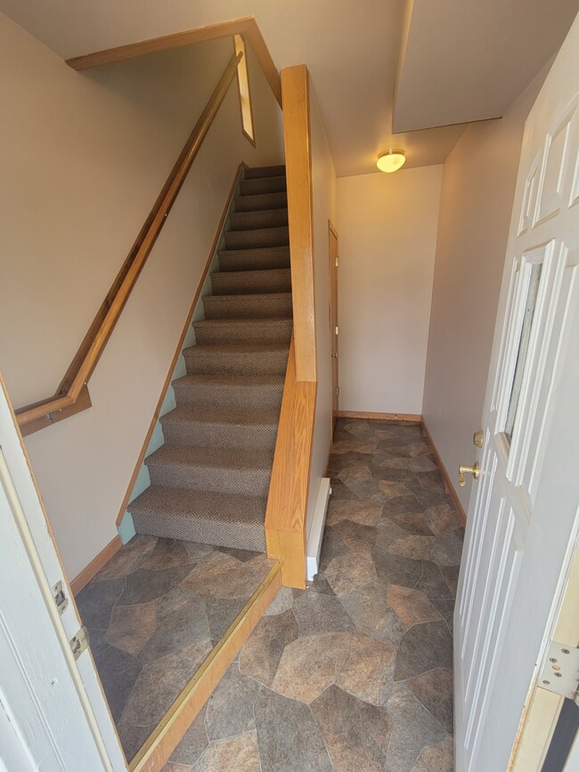 stairs leading to upper unit (your unit) as well as basement for laundry - 34 7th St