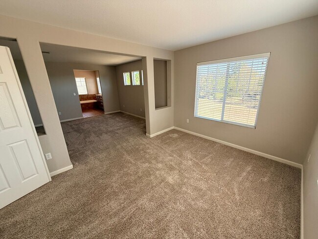 Building Photo - Modern 4-Bedroom Home in Renaissance Neighborhood Near Trails