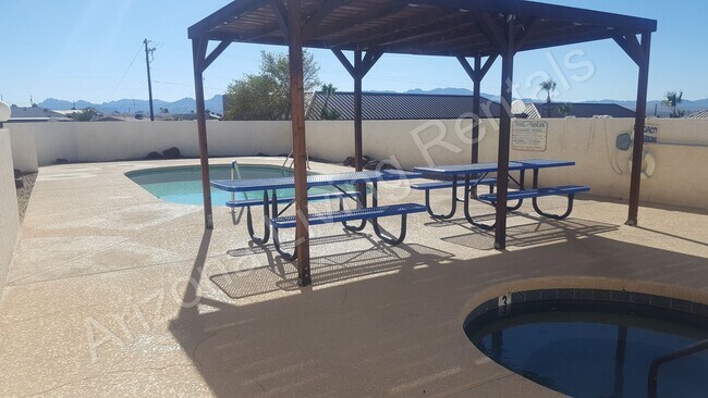 Building Photo - CONDO WITH POOL AND GARAGE