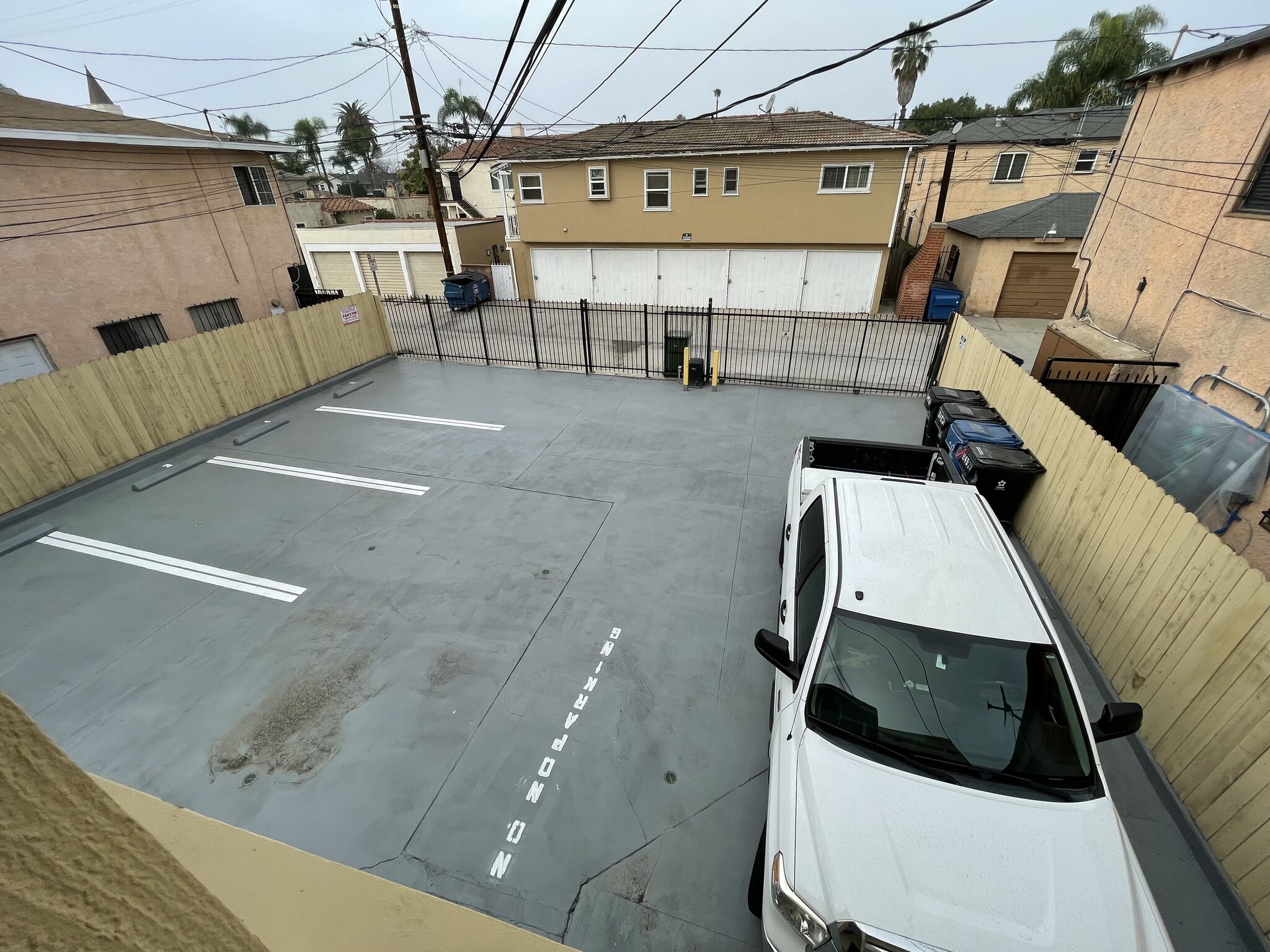 Rear parking with automatic gate - 8453 S Van Ness Ave