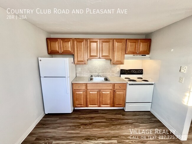 Building Photo - New Cabinets & Flooring! Large 2-bed w/ ea...