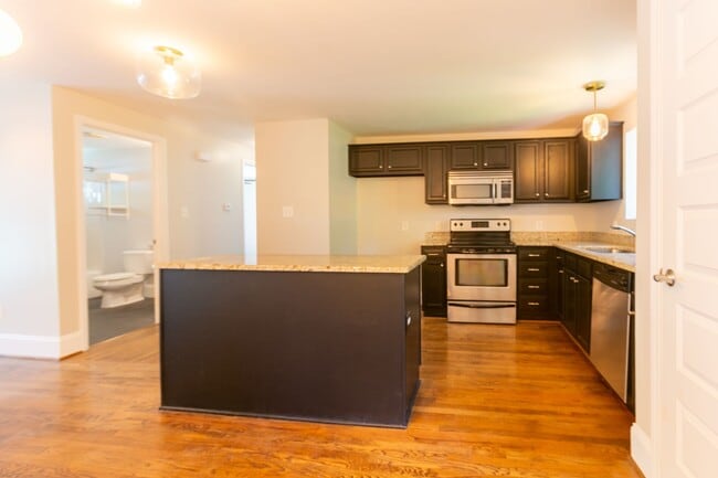 Building Photo - **Application pending 5/1/2026**Stunning Carrboro Condo available early June!