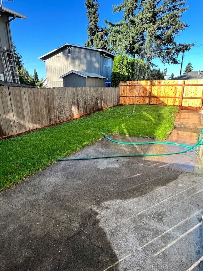 Building Photo - Remodeled Home with New Flooring, Quart Counters, W/D, Fenced Yard, Parking & MORE!