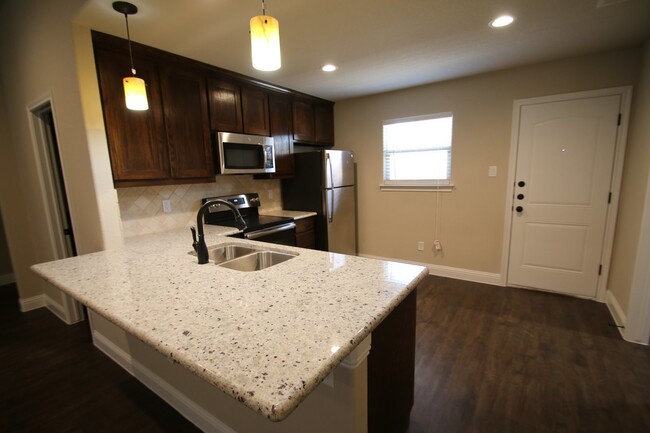 Building Photo - 1301-1305 White Sand Dr.