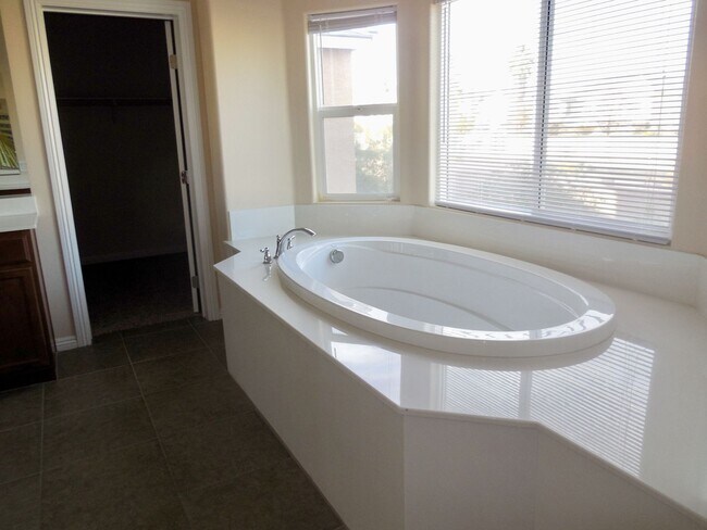Building Photo - Spacious House w/Tons of Storage,Tile & Wo...