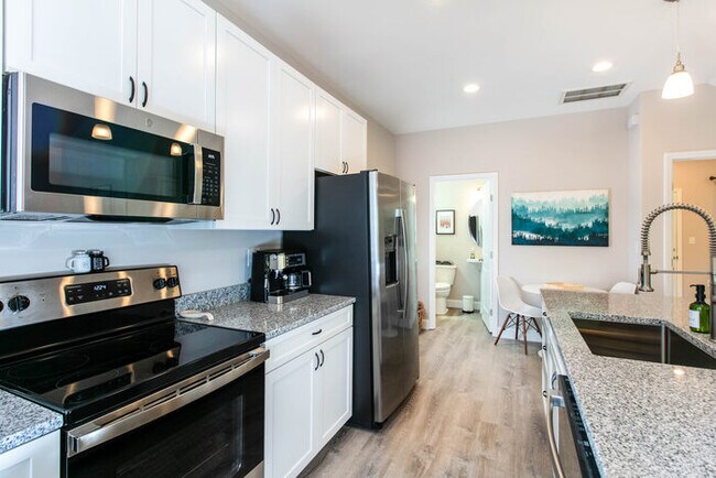 Building Photo - Spacious Three Bedroom w/ Loft Space