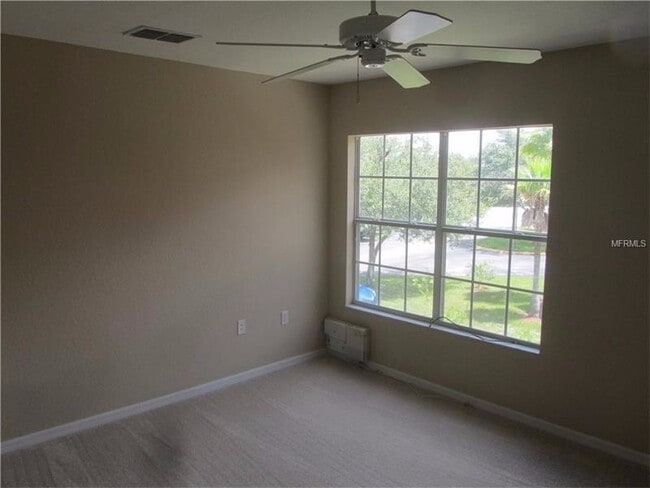 Building Photo - Water view condo with garage in sought after westchase