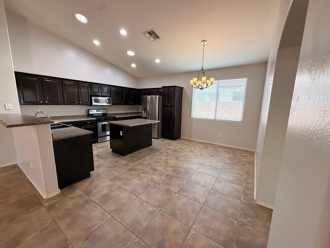 Building Photo - *NEW* Custom Paint/*NO* Carpet 3 BD/2 Bath Spacious Surprise Home!