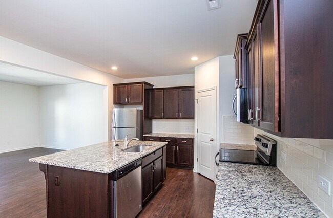 Building Photo - 2-Car Garage Bonterra Townhome
