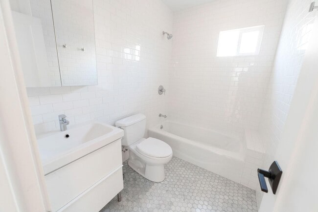 Building Photo - Spacious and Updated property in the heart...