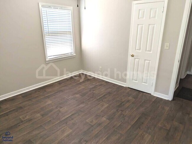 Building Photo - Updated Bungalow with Massive Deck and Fully Fenced Yard!