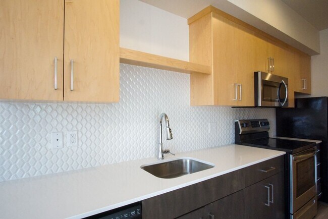 Building Photo - Modern & Chic Corner 1-Bed w/Private Balcony!