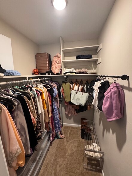 Walk-in closet in primary bedroom upstairs - 1967 Airy Cir