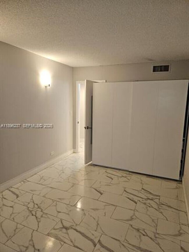 Building Photo - 1800 NE 114th St