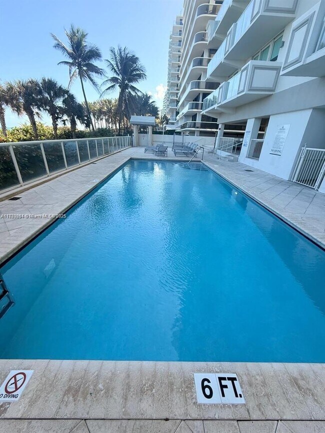 Building Photo - 9499 Collins Ave