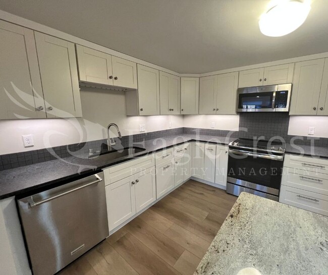 Building Photo - Lovely Two-Bedroom Condominium Located in ...