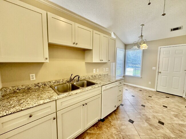Building Photo - Rivers End Three Bedroom Home with a Fence...