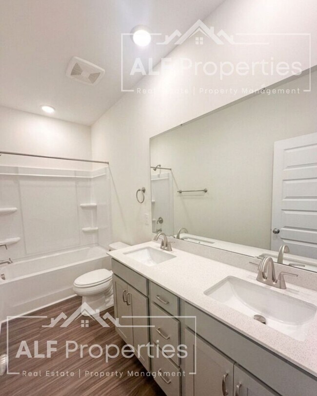 Building Photo - Luxury Downtown Wake Forest Living – Brand-New End Unit with Rooftop Terrace