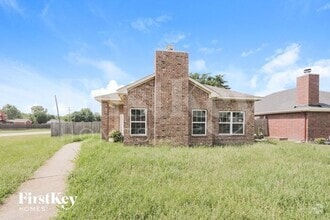 Building Photo - 1633 Mockingbird Ln