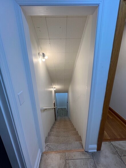 Stairs leading to available apartment - 116 Cumberland Ct