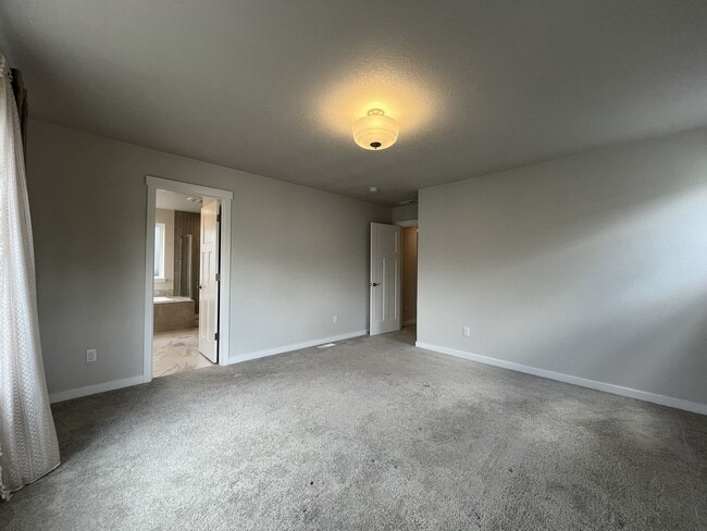 Building Photo - Stunning 2024 Built 5BR Home with Main-Level Suite, EV Charger & Covered Patio Near River Terrace