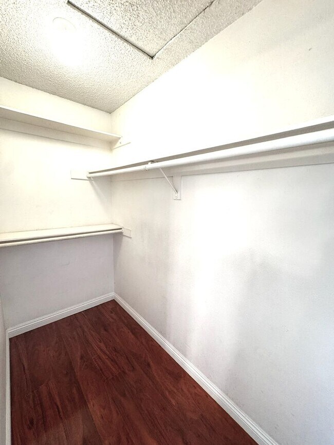 Building Photo - 2 Bedroom, 2 Bath Upstairs Condo with Private Balcony & 2-Car Garage, Gated Community, Water/Tras...