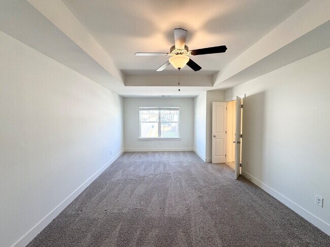 Building Photo - Stylish 3BR Townhome with Private Yard & T...
