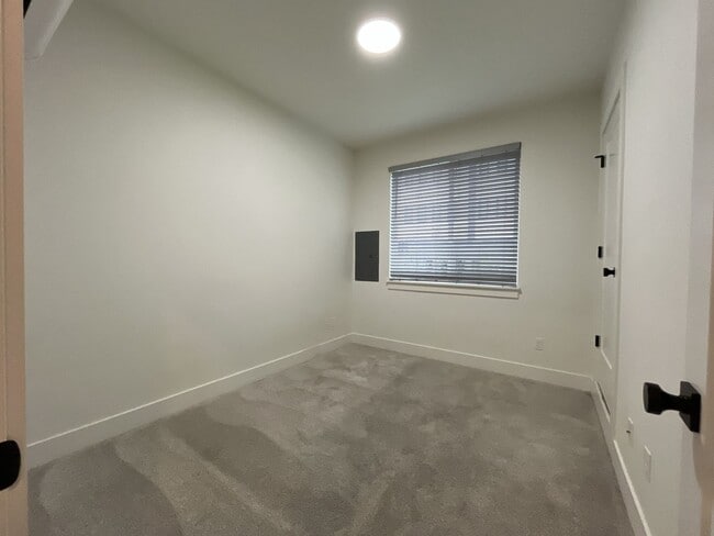 Building Photo - Modern 2-Bed, 1.5-Bath Condo with Custom Kitchen, Private Patio, and Prime Location