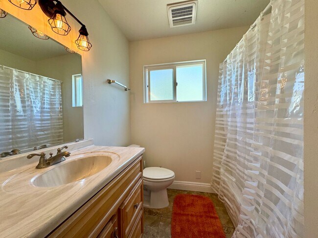 Building Photo - 4 BED / 2 BATH NEAR SDSU w/ LARGE BACKYARD...