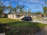 Building Photo - 401 E 7th St