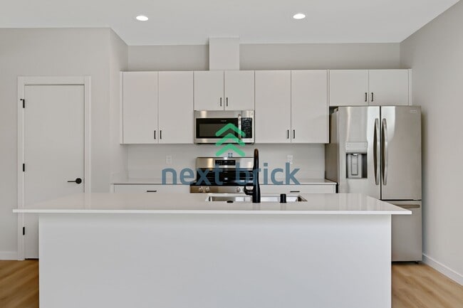 Building Photo - Brand-New 2026 Townhome | 3 Bed | 2.5 Bath | 1,560 Sq Ft | EV Garage | A/C Included