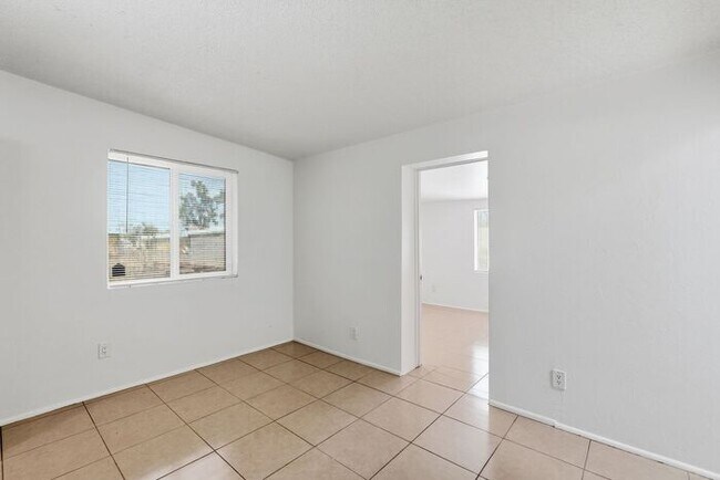 Building Photo - Bright 3-Bed Tucson Rental Home with Expansive Fenced Backyard Near U of A