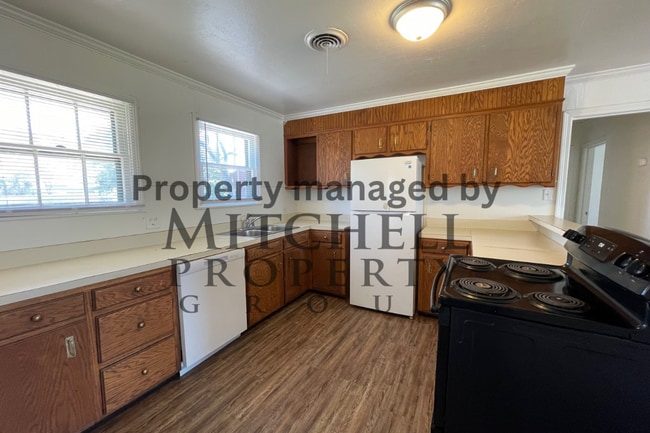 Building Photo - Welcome to 4207 S. Hughes! Nice 2 bedroom,...